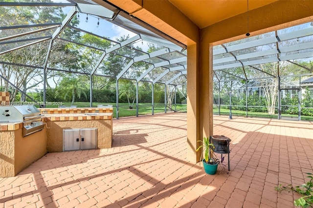 view of patio featuring a lanai, grilling area, and area for grilling