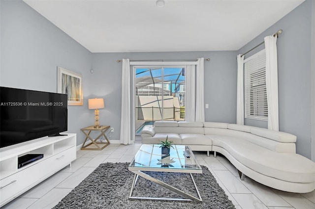 living room with light tile patterned flooring