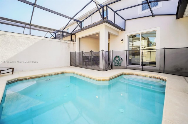 view of pool featuring a lanai