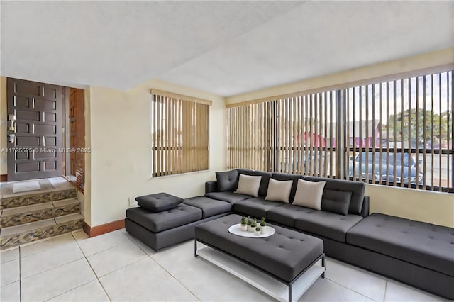 living room featuring light tile patterned flooring