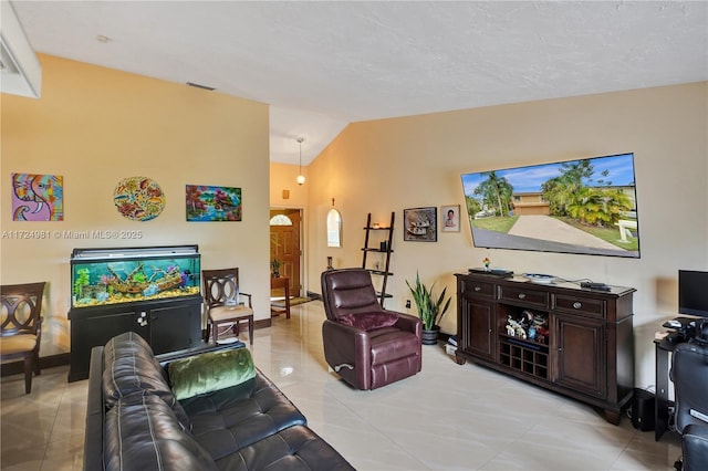 tiled living room with vaulted ceiling