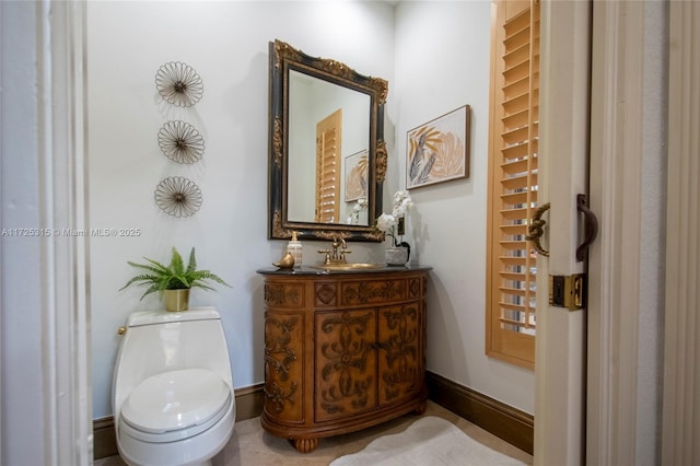 carpeted bedroom with baseboards, a tray ceiling, and crown molding