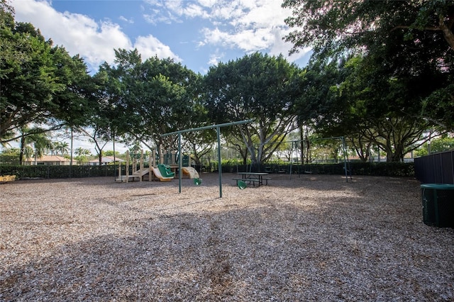 community jungle gym with fence and central air condition unit