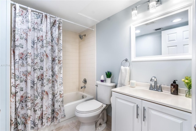 full bathroom with vanity, shower / bath combination with curtain, and toilet