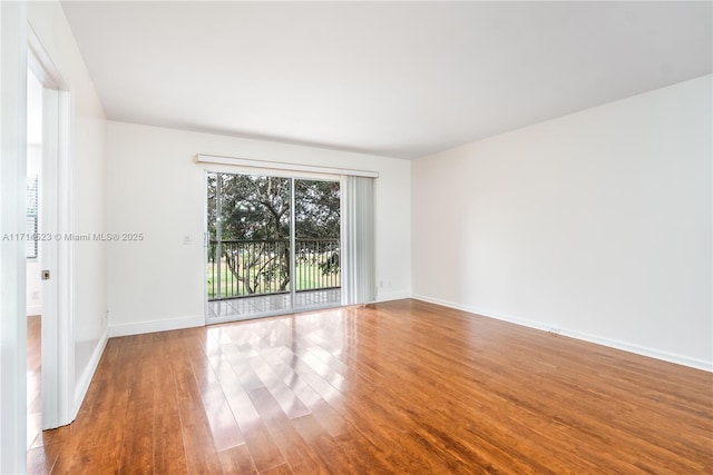 empty room featuring hardwood / wood-style floors