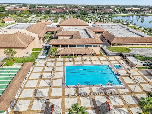 view of pool with a water view