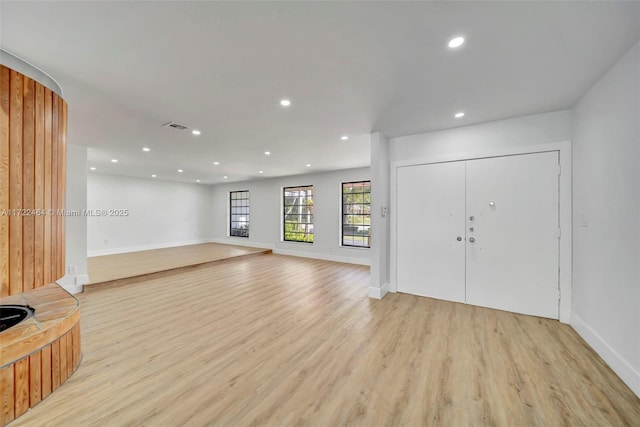 interior space with light hardwood / wood-style flooring