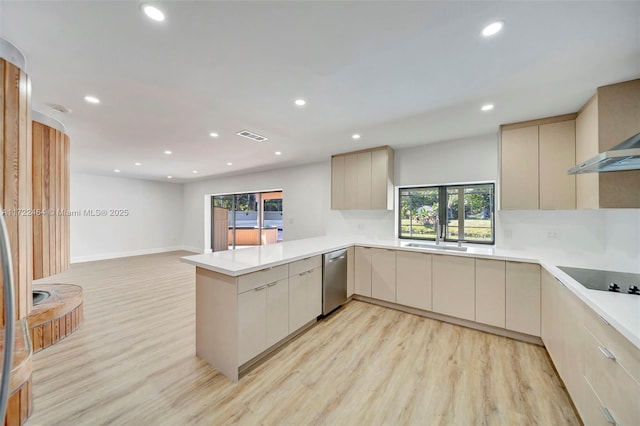 kitchen with kitchen peninsula, black electric cooktop, sink, light hardwood / wood-style flooring, and stainless steel dishwasher