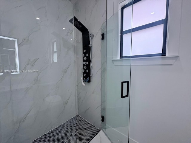 bathroom featuring an enclosed shower