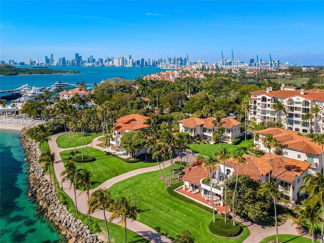 birds eye view of property featuring a water view