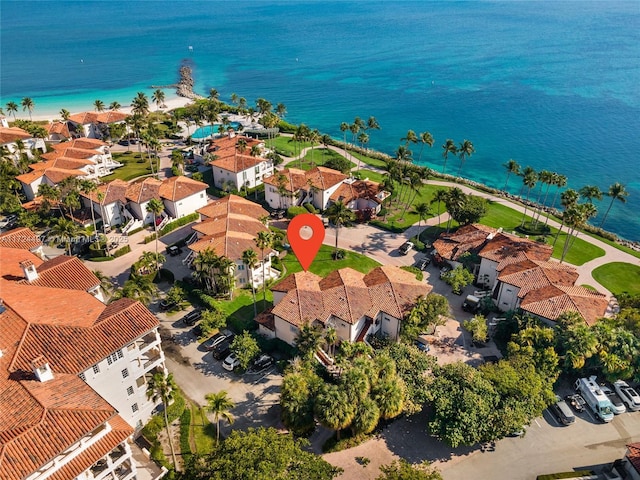 bird's eye view featuring a beach view and a water view