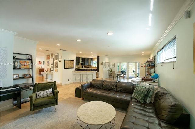 living room featuring crown molding