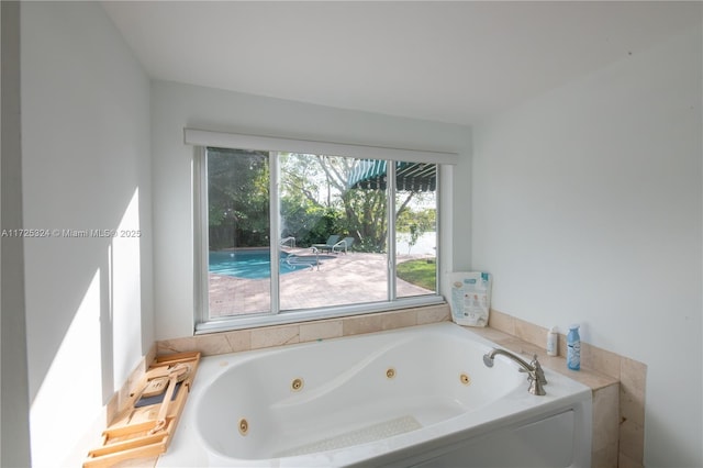 bathroom featuring a washtub