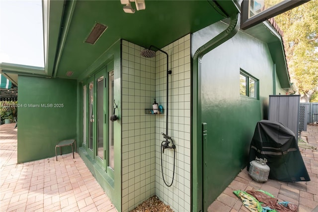 exterior space with a tile shower