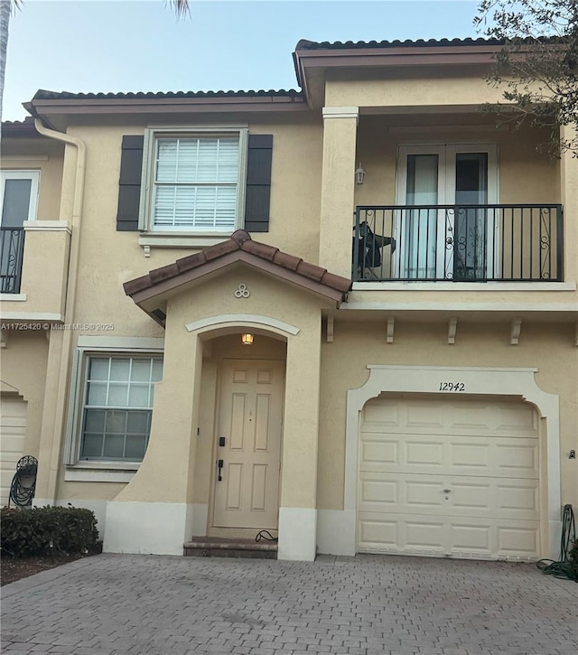 view of front of property with a garage