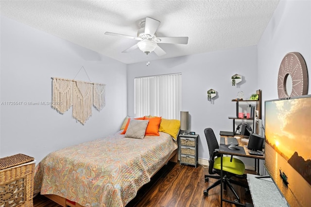 bedroom featuring a textured ceiling, ceiling fan, and dark hardwood / wood-style floors