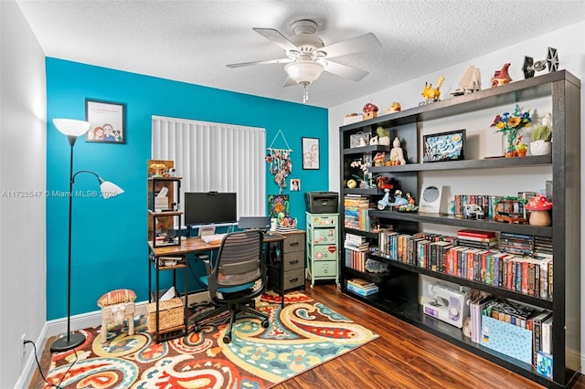 office with wood-type flooring, a textured ceiling, and ceiling fan