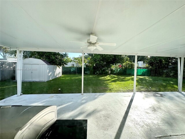 view of patio featuring ceiling fan