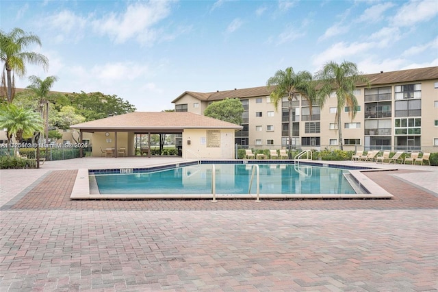 view of pool featuring a patio