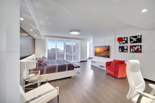 9751 E Bay Harbor Dr Unit Phsb-1604, Bay Harbor Islands, FL 33154 - bedroom featuring wood finished floors, access to exterior, baseboards, and recessed lighting