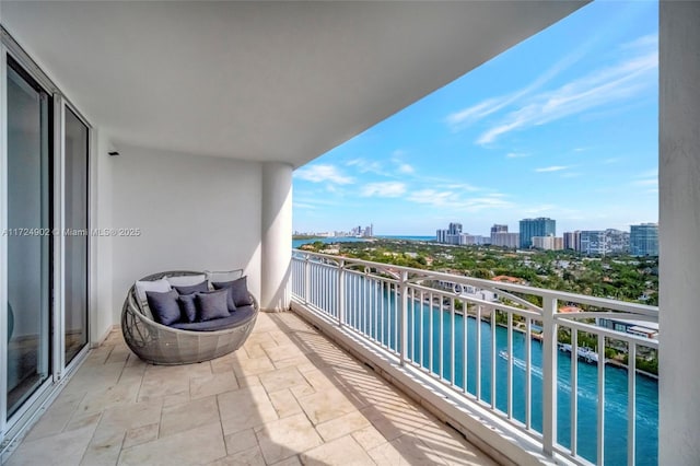 balcony featuring a water view