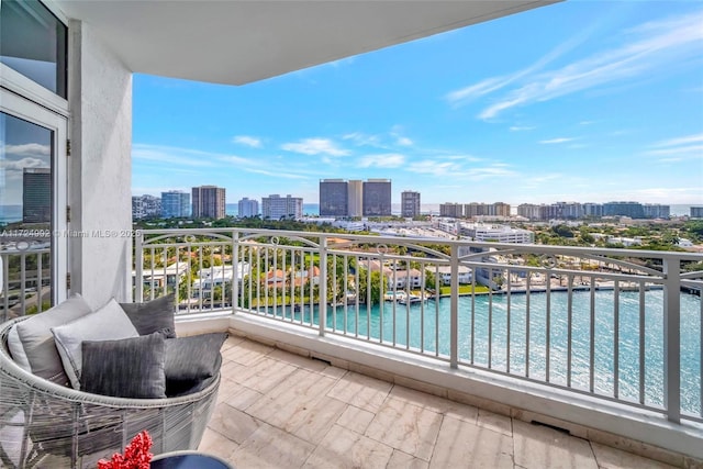 balcony featuring a water view