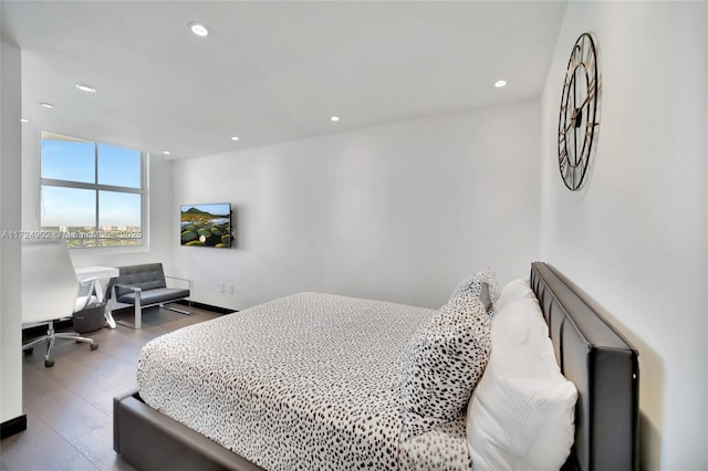 bedroom with wood-type flooring