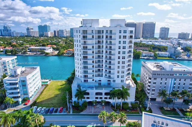 drone / aerial view with a water view