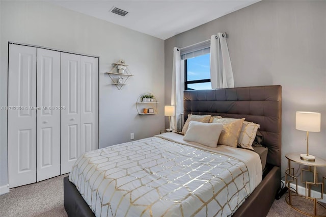 bedroom with a closet and carpet flooring