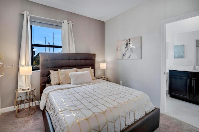 carpeted bedroom with sink