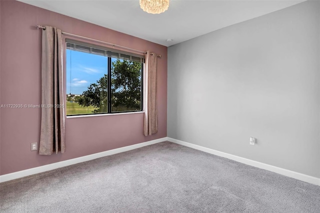 unfurnished room with carpet