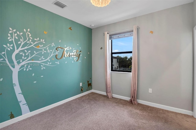 view of carpeted spare room