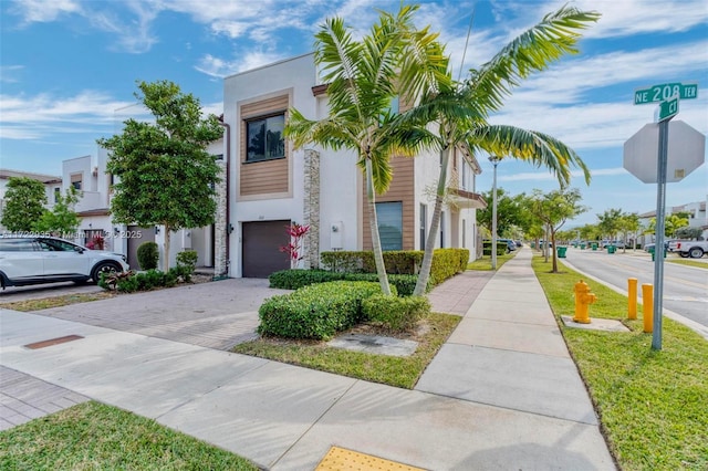 view of front of property featuring a garage