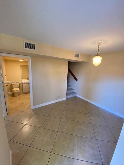 view of tiled spare room