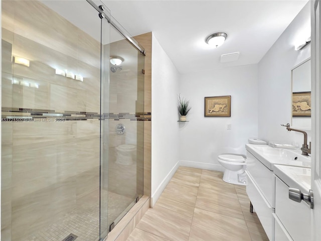 bathroom featuring toilet, an enclosed shower, tile patterned flooring, and vanity