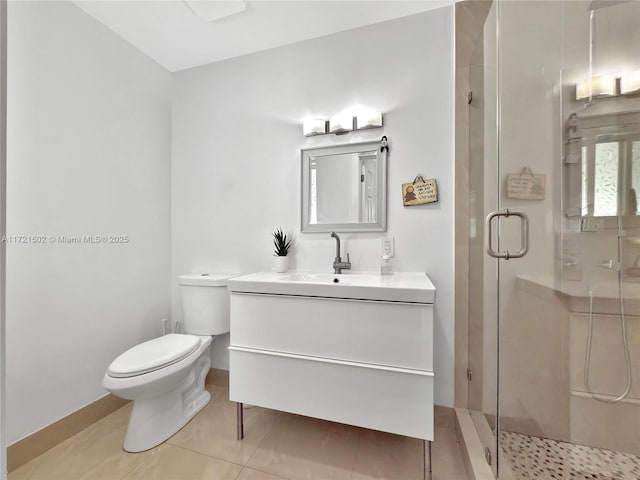 bathroom featuring toilet, tile patterned flooring, a shower with shower door, and vanity