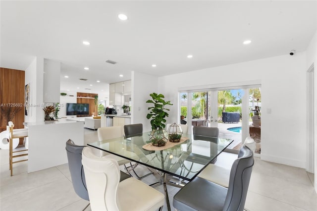 tiled dining space with french doors