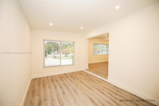 empty room with light wood-type flooring