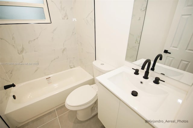 full bathroom featuring toilet, tiled shower / bath combo, tile patterned floors, and vanity