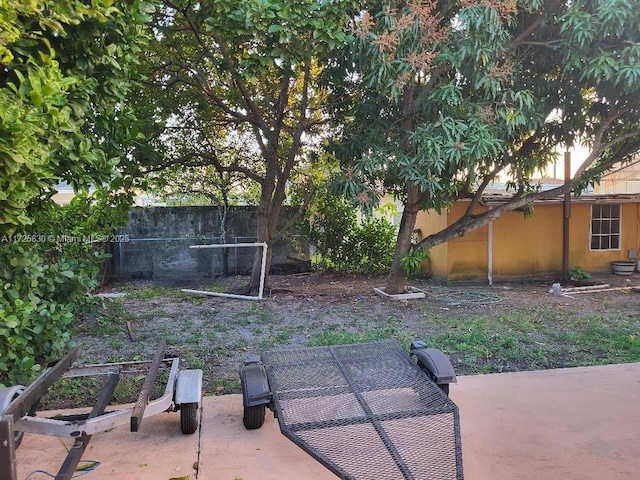 view of yard with a patio area and fence