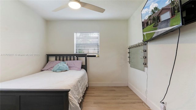 bedroom featuring ceiling fan and light wood-type flooring