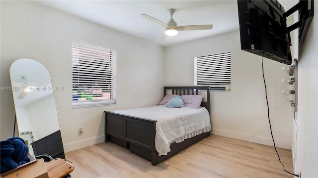 bedroom featuring ceiling fan and light hardwood / wood-style floors