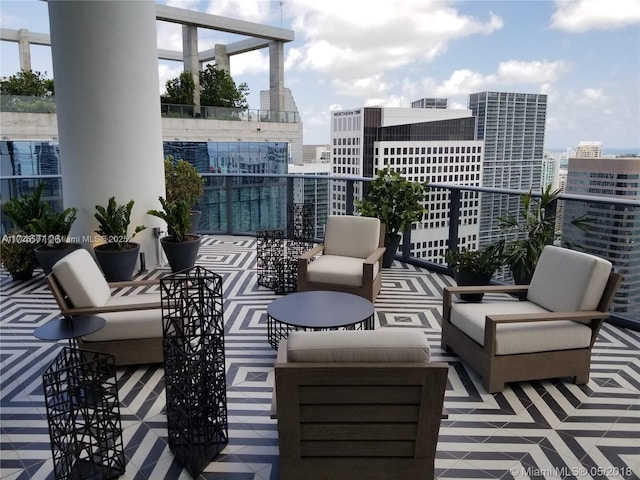 view of patio / terrace with a balcony