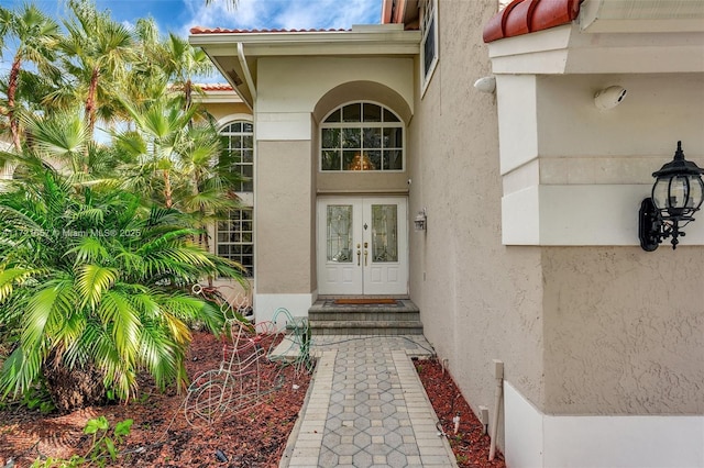 entrance to property featuring french doors