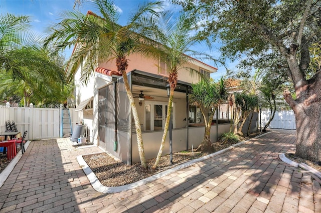 view of home's exterior with a patio area