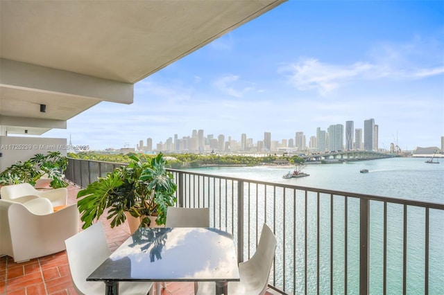 balcony featuring a water view