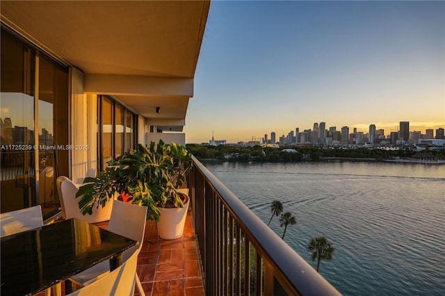 balcony at dusk with a water view