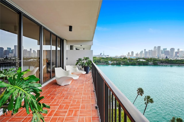 balcony featuring a water view