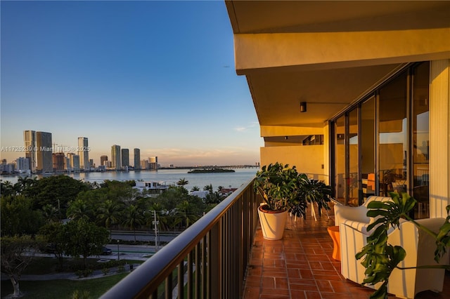 balcony at dusk with a water view