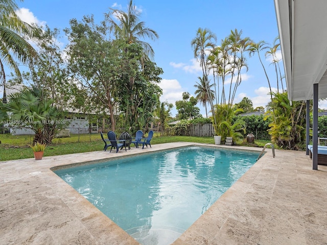 view of swimming pool featuring a patio